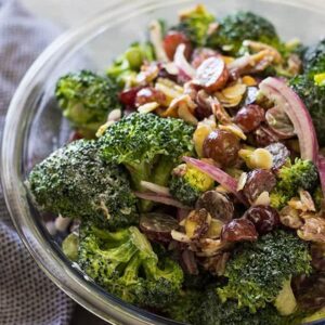 This Broccoli Bacon and Grape Salad combines crisp broccoli, crunchy bacon, sweet red grapes all in a creamy dressing. | www.countrysidecravings.com