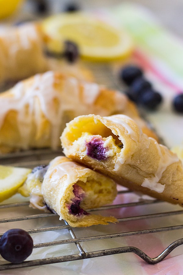 These Lemon Blueberry Cheesecake Crescent rolls make a great addition to any breakfast or brunch table! They are super easy to make and taste delicious! 