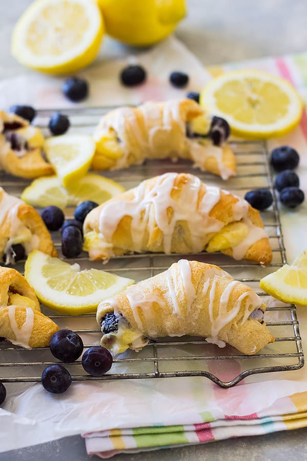 These Lemon Blueberry Cheesecake Crescent rolls are easy to make and perfect for brunch! 