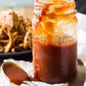 Texas style BBQ sauce in jar with spoon