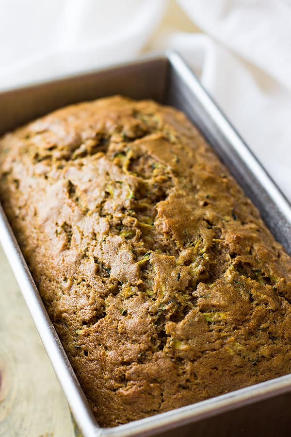 An easy zucchini quick bread recipe that is full of fresh zucchini, cinnamon and clove. Your house will smell amazing!