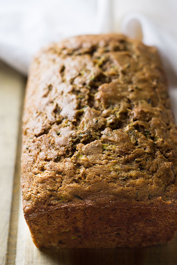 This moist easy zucchini bread will become your go to recipe! It's easy to make, loaded with freshly grated zucchini and warm fall spices.