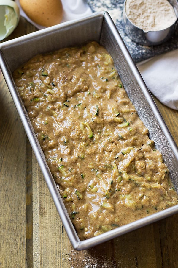 This Easy Zucchini Quick Bread recipe will become a family staple! It's full of freshly grated zucchini, cinnamon, and options for stir-ins!