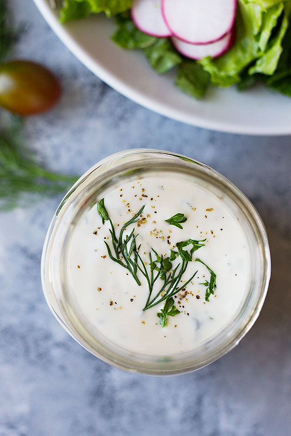 This Homemade Buttermilk Ranch Dressing is an easy recipe to have in your back pocket! It's creamy, full of fresh herbs and perfect for all your salads.