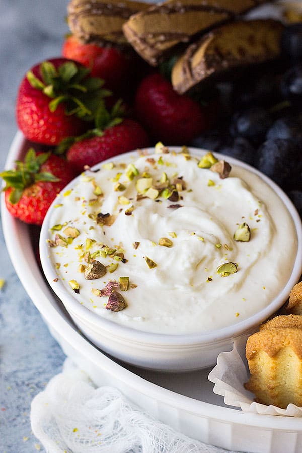 This Quick and Easy Marshmallow Fruit Dip is light, fluffy and creamy! It goes great at parties and is perfect for dipping fruit! 