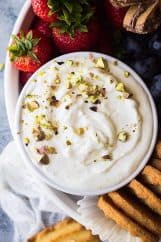 This Quick and Easy Marshmallow Fruit Dip is light, fluffy and creamy! It goes great at parties and is perfect for dipping fruit!