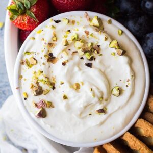 This Quick and Easy Marshmallow Fruit Dip is light, fluffy and creamy! It goes great at parties and is perfect for dipping fruit!