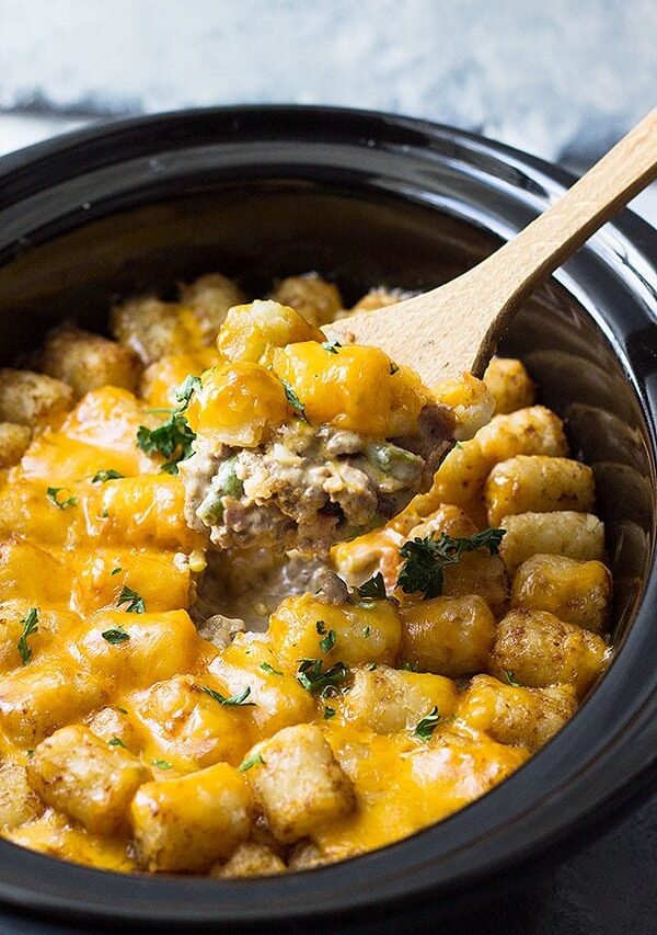 This Slow Cooker Bacon Cheeseburger Tater Tot Casserole is made from scratch without any canned soups! It's creamy, comforting and a one dish dinner!