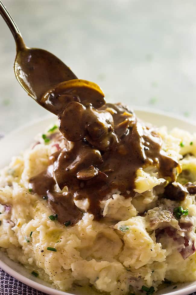 The Easiest Mashed Potatoes are awesome topped with gravy or even just butter! Serve with any cut of meat for a home cooked meal!