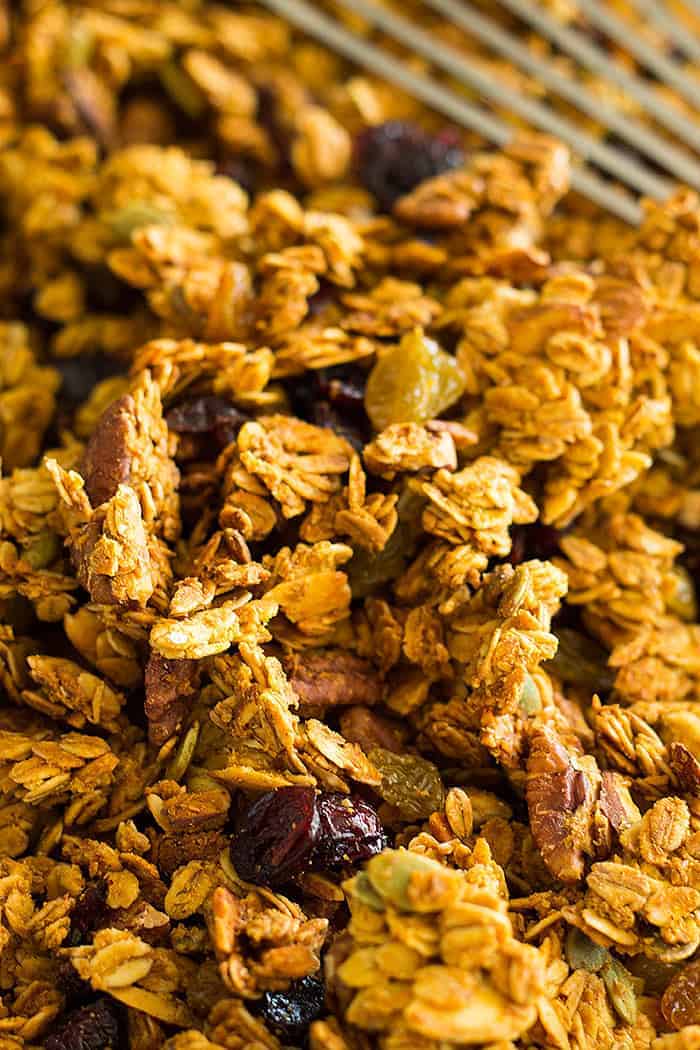 This easy and healthy Crunchy Pumpkin Granola is made with real pumpkin! It has tons of fall goodies like pecans, pumpkin spice and pumpkin seeds!