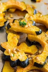 This Parmesan Roasted Acorn Squash is an easy savory side dish. It uses simple ingredients and even roasts the seeds!