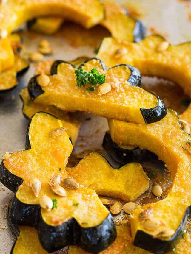 This Parmesan Roasted Acorn Squash is an easy savory side dish. It uses simple ingredients and even roasts the seeds!