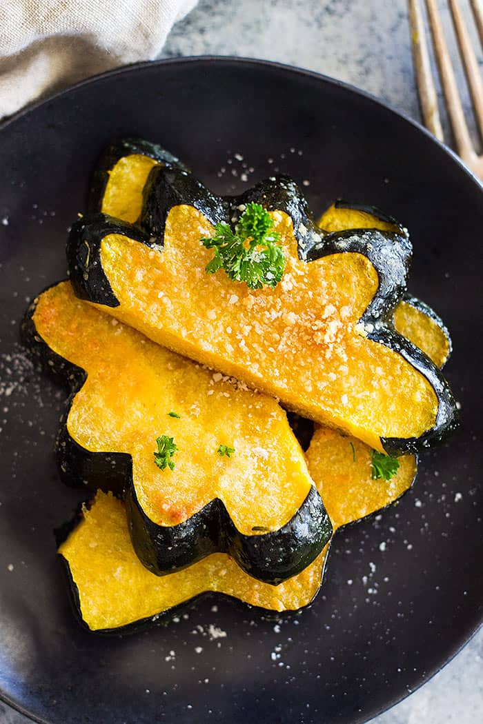 This simple Parmesan Roasted Acorn Squash is an easy side dish. It uses just a few simple ingredients and you can even roast the seeds!