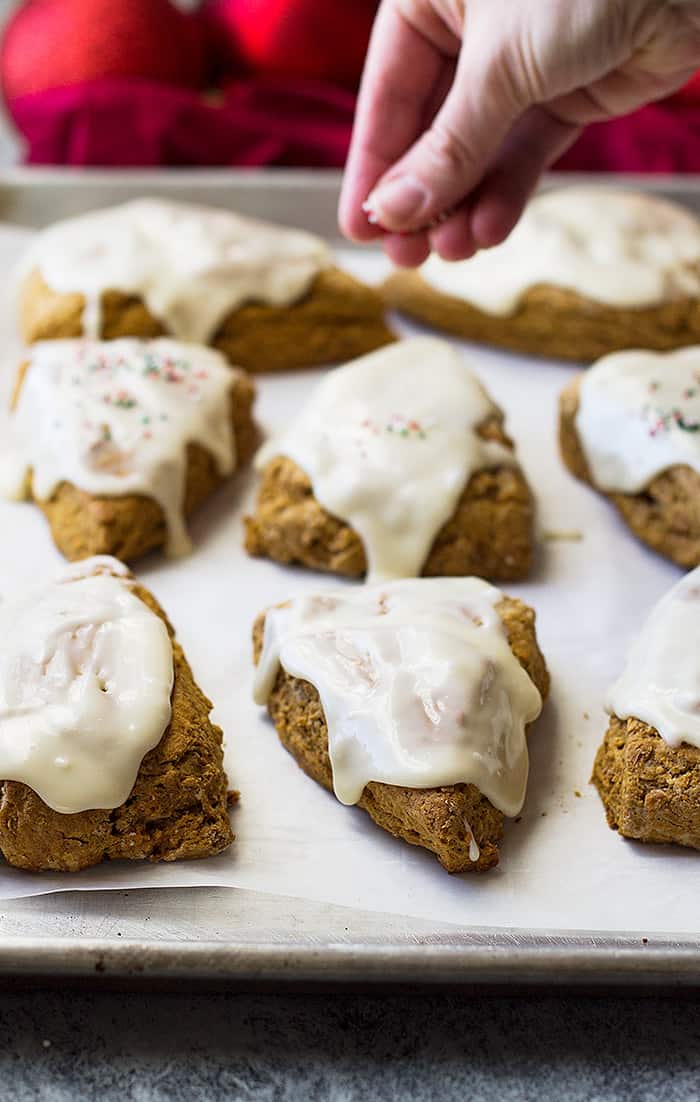 These Gingerbread Scones with cream cheese frosting are like a gingerbread cookie only in breakfast form!! Filled with cinnamon, ginger, clove, and molasses make these a wonderful breakfast treat!!
