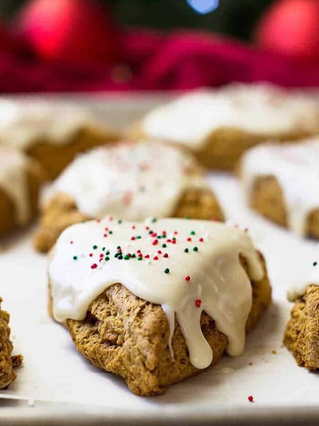 These Gingerbread Scones with cream cheese frosting are like a gingerbread cookie only in breakfast form!! Filled with cinnamon, ginger, clove, and molasses make these a wonderful breakfast treat!!