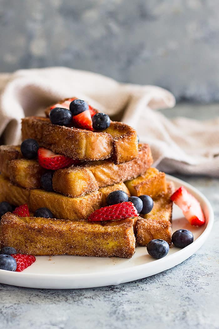 Cinnamon Sugar French Toast Sticks - are an easy kid friendly breakfast that you can make ahead and freeze. 