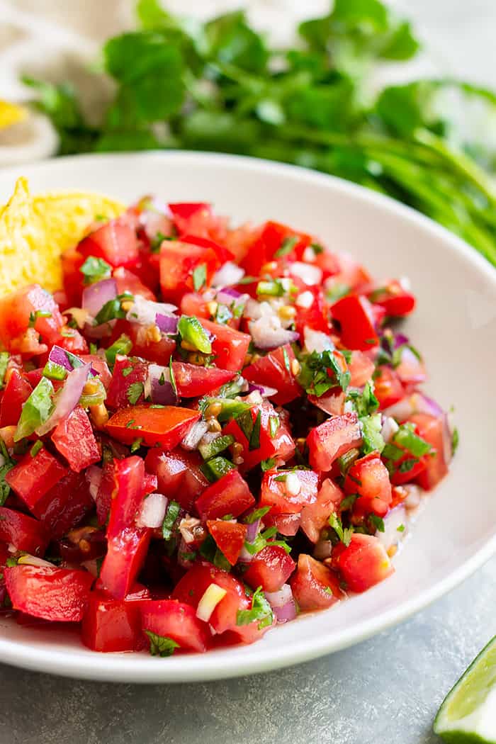 How to make Homemade Pico de Gallo -a simple and fresh salsa. Make this as chunky or smooth as you like and as spicy or mild as you like.