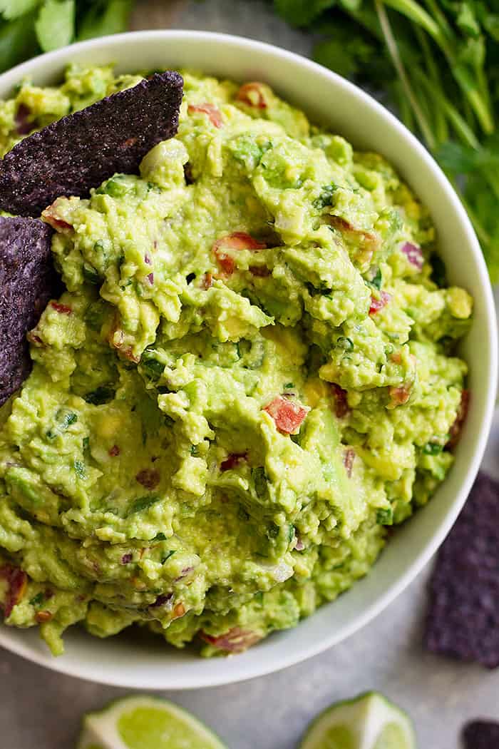 Homemade Guacamole Recipe -is a quick and easy recipe to make! It's perfect for dipping chips or veggies. Or on top of any Mexican dish!