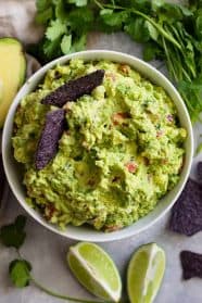 Homemade Guacamole Recipe -is a quick and easy recipe that's great for any party! It's healthy, great to dip chips or vegetables in, and it's great with any Mexican dish!