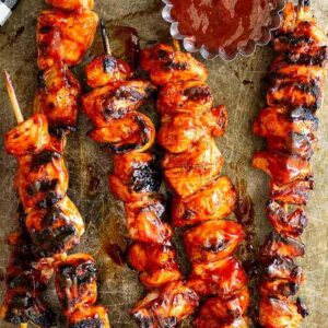 These BBQ Marinated Chicken Kabobs are marinated in an easy homemade BBQ sauce then grilled for that perfect sticky sweet chicken kabob!