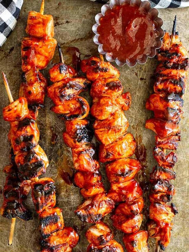 These BBQ Marinated Chicken Kabobs are marinated in an easy homemade BBQ sauce then grilled for that perfect sticky sweet chicken kabob!