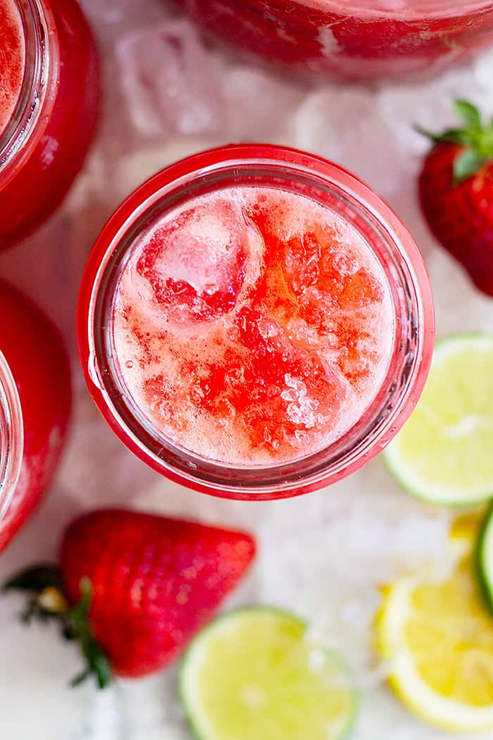 This Strawberry Lemonade Margarita is the perfect summertime drink! It's refreshing and easy to make and perfect for a crowd! #strawberry #cocktail #margarita #easy