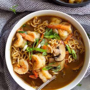 This Easy Shrimp Ramen Soup is so much better than that packet of noodles!! Packed with vegetables, shrimp, and full of flavor! #shrimp #soup #easyrecipe #ramen