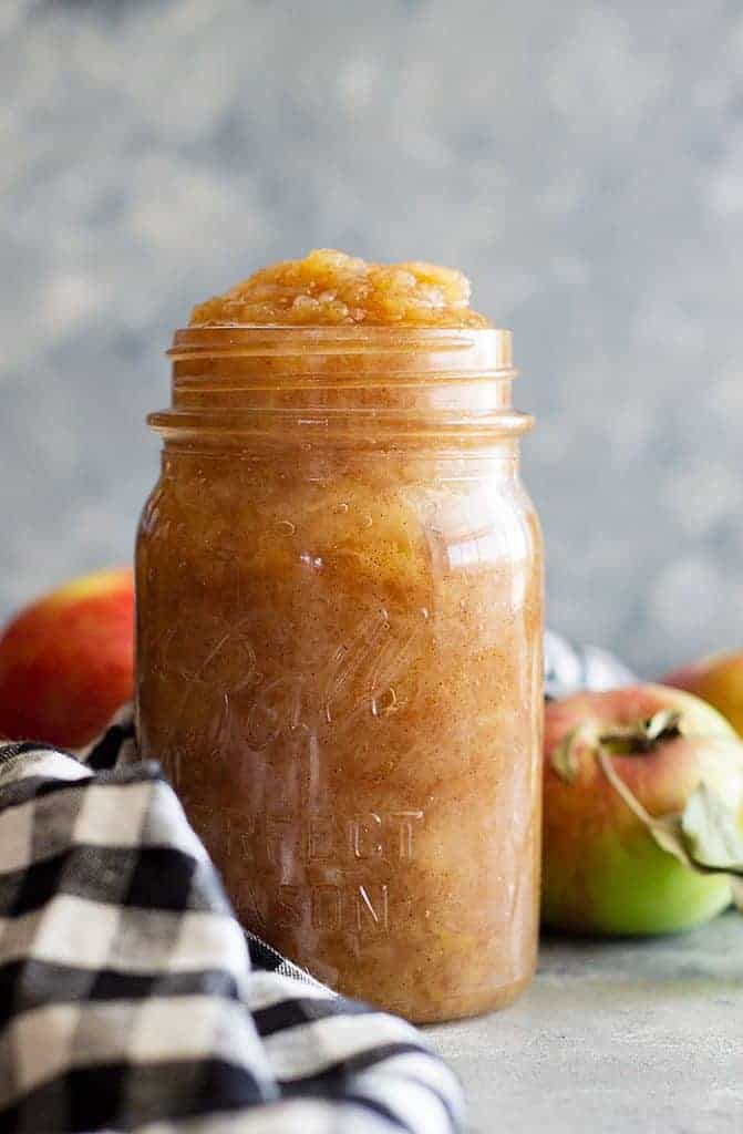 Easy Homemade Applesauce that is perfectly spiced and so comforting! It's a healthy snack that is sugar free, full of fiber, and flavor! #apple #applesauce #easyrecipe #homemadeapplesauce