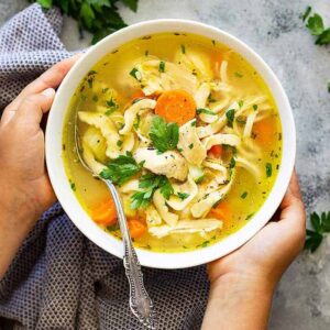 Need a comforting bowl of chicken noodle soup? This Instant Pot (Pressure Cooker) Chicken Noodle Soup is easy to make and full of flavor. And thanks to the Instant Pot it's ready in a fraction of the time! #chicken #chickennoodlesoup #instantpot