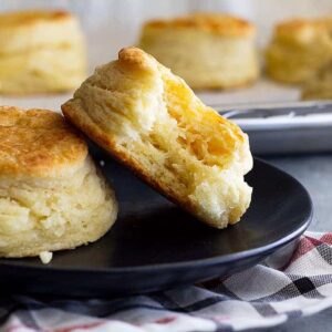 How to make flaky buttermilk biscuits. This guide will show you everything to make fluffy, buttery, flaky biscuits. #homemadebiscuits #buttermilkbiscuits #bread #biscuitrecipe