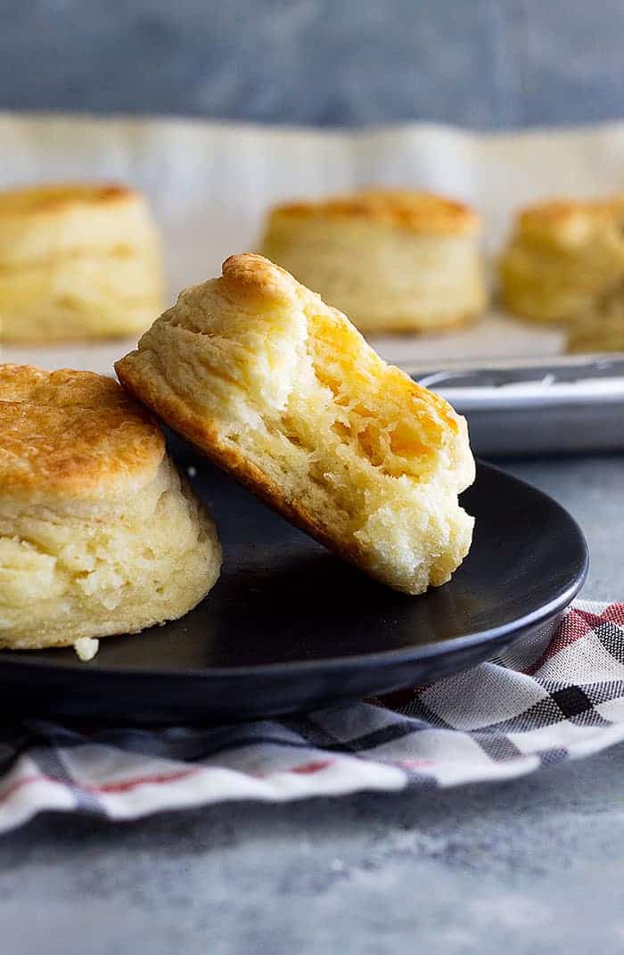 How to make flaky buttermilk biscuits. This guide will show you everything to make fluffy, buttery, flaky biscuits. #homemadebiscuits #buttermilkbiscuits #bread #biscuitrecipe