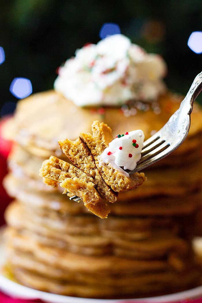 These warmly spiced Gingerbread Pancakes will be perfect for Christmas morning! #gingerbreadpancakes #christmasmorningbreakfast