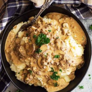 This Ground Beef Stroganoff can be on your table in 30 minutes making it a wonderful weeknight meal! Plus, it's completely homemade no condensed soup! #groundbeef #stroganoff