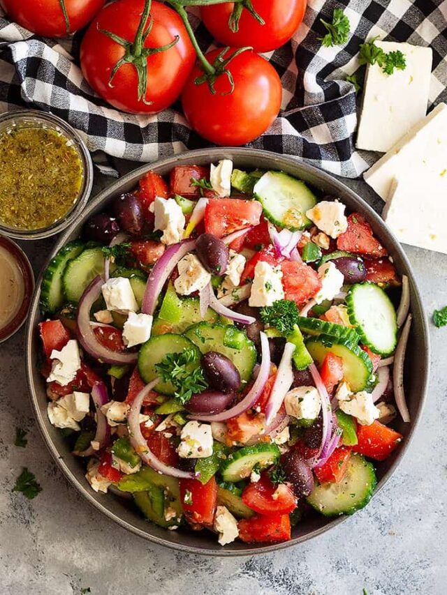 Greek Salad is a quick and simple salad that’s full of flavor and crunch. Greek Salad Ingredients are bright fresh and delicious. Pair this salad with leftover rotisserie chicken or seafood for a delicious and healthy meal! #greeksalad #healthysalad