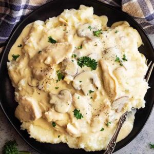 This Easy Chicken Stroganoff can be on your table in 30 minutes making it a perfect busy night meal! It's made with no canned soups and it's full of flavor! #chickenrecipe #chickenstroganoff