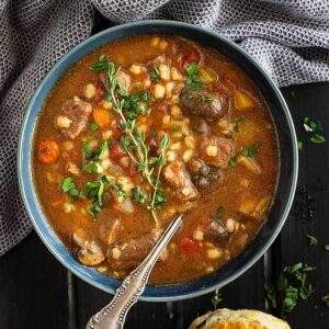 This Instant Pot Beef and Barley Soup is a quicker way to enjoy this hearty and flavorful soup! It's full of tender meat and vegetables and perfectly satisfying! #intsantpotsoup #beefandbarleysoup