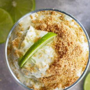 This Lime Cheesecake Fluff is a quick and easy no bake dessert! It's bright lime flavor is a perfect refreshing way to end a meal! #limedessert #nobakecheesecake