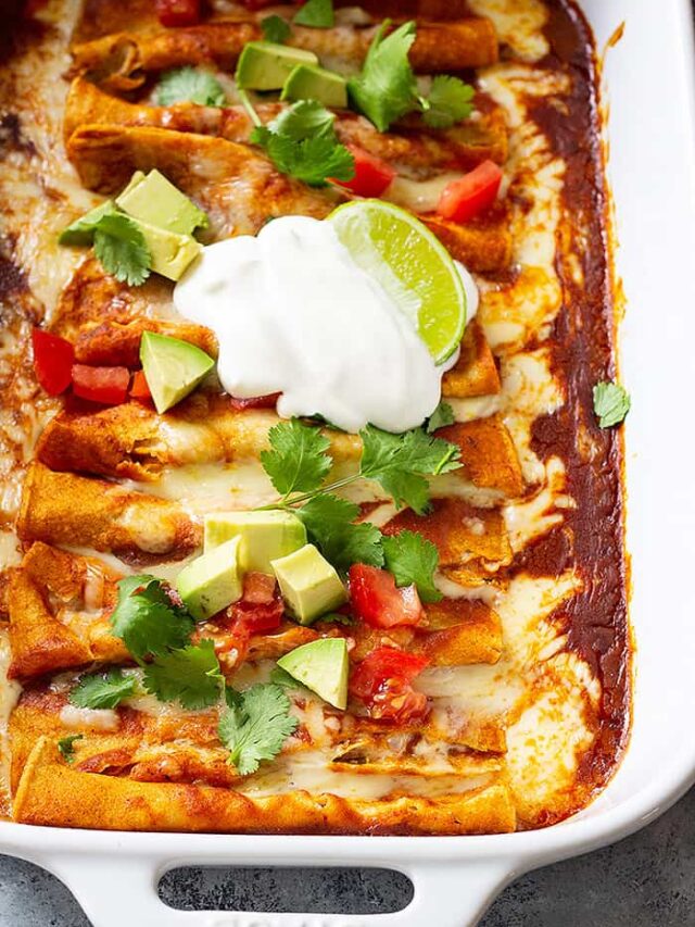 These Cheese Enchiladas are corn tortillas filled with monterey jack cheese and topped with a homemade red enchilada sauce! They are easy to make and will become a family favorite! #redenchiladas #cheeseenchiladas