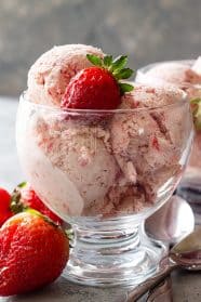 This easy No Churn Strawberry Ice Cream requires no cooking or churning! It's creamy, smooth, and delicious! #nochurnicecream #strawberryicecream