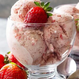 This easy No Churn Strawberry Ice Cream requires no cooking or churning! It's creamy, smooth, and delicious! #nochurnicecream #strawberryicecream
