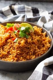 Easy Spanish Rice is the perfect side dish for all you Mexican inspired meals! Instant pot and stove top instructions included! #spanishrice #mexicanrice