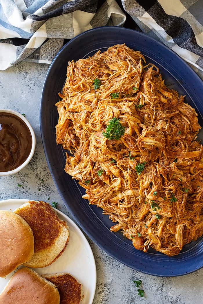 A large plate of slow cooker bbq chicken.