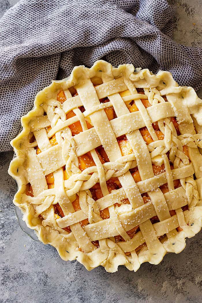 peach pie ready to be baked