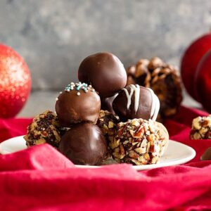 Homemade Chocolate Truffles stacked on top of each other.