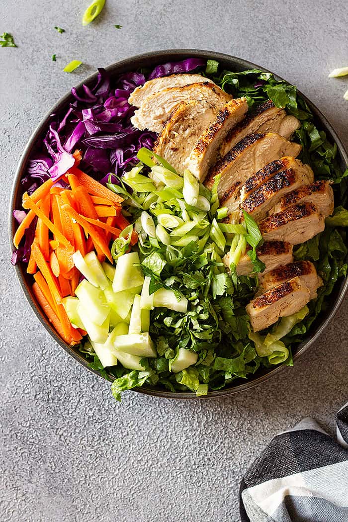 Salad ingredient arranged in a bowl.