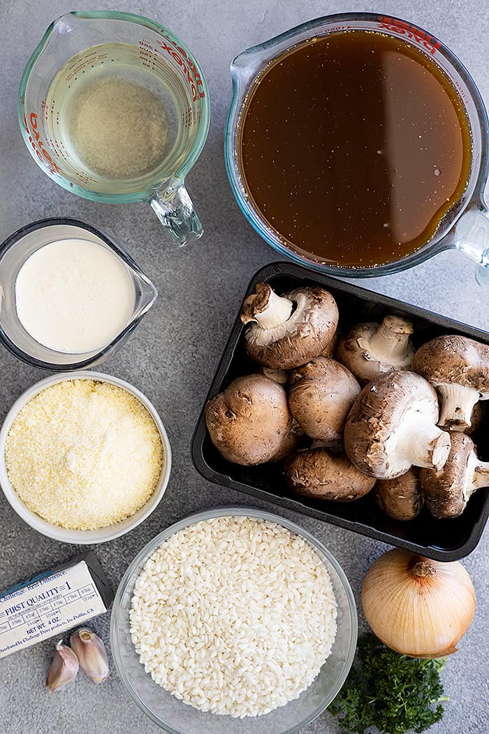 All the ingredients needed to make mushroom risotto.