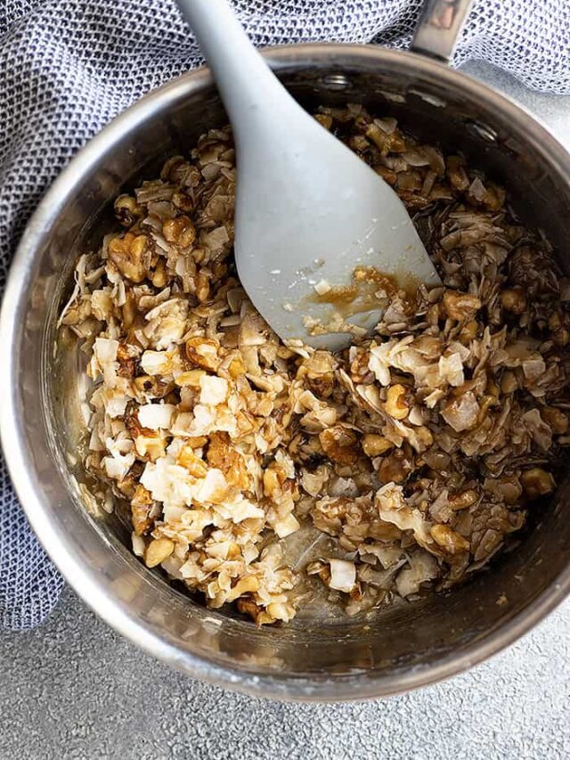 Overhead view of lazy daisy frosting in a pan ready to spread onto a cake.