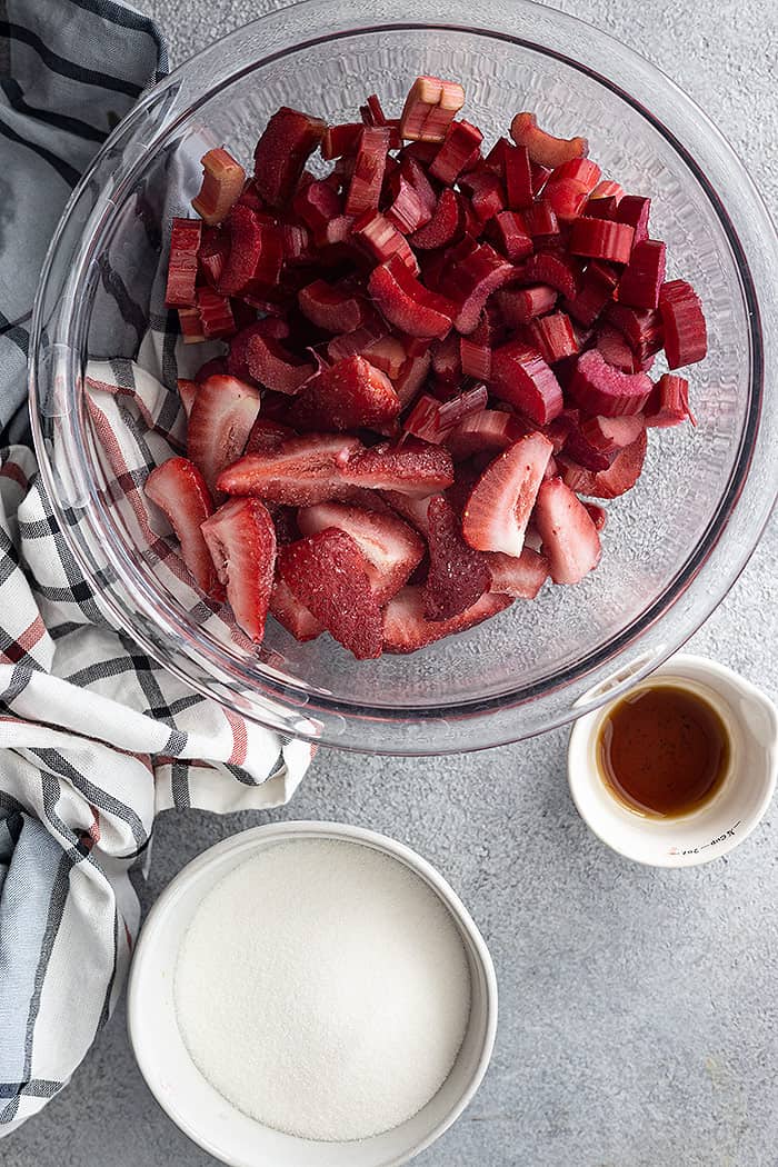 Ingredients to make strawberry rhubarb sauce.