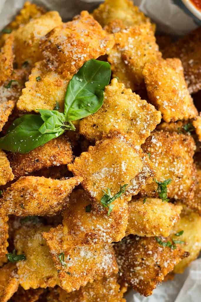 platter filled with toasted ravioli 