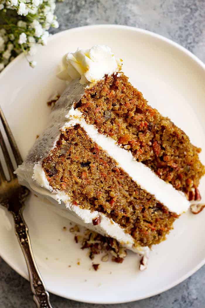 Simple carrot cake on a white plate.